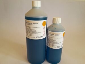 two bottles containing deep blue alkaline copper strike bath electroplating solutions