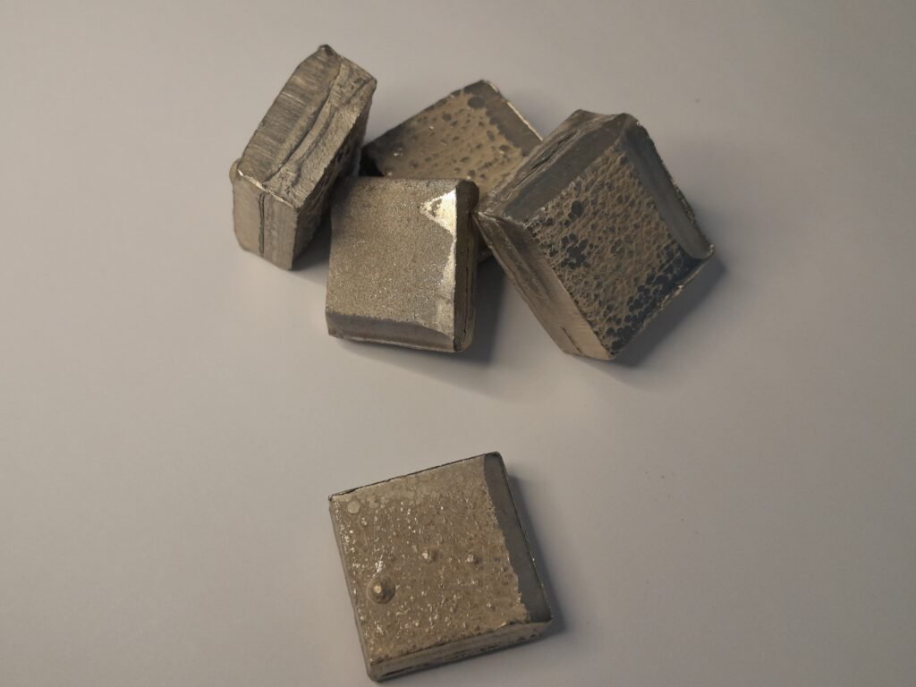 an image of 5 nickel anode chunks